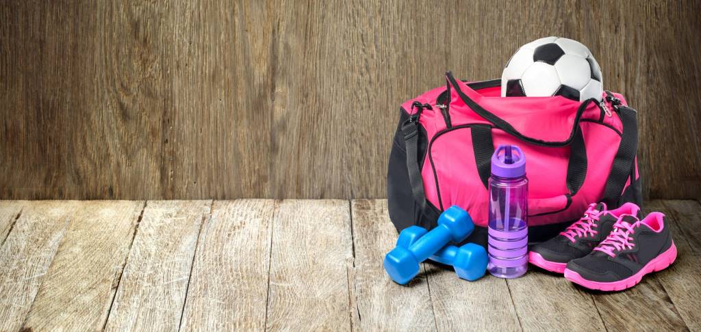 Sports bag with sports equipment