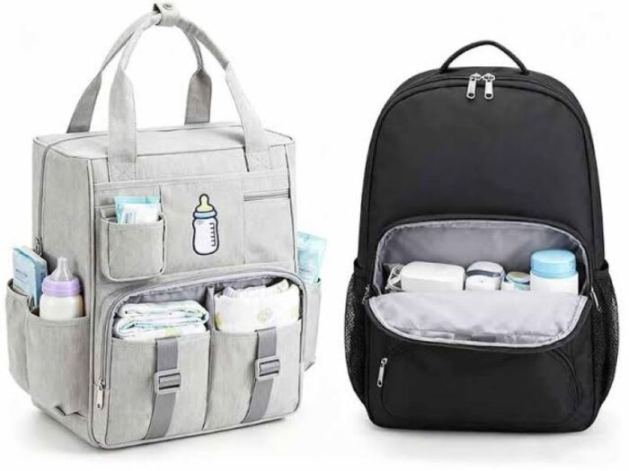 Well-organized diaper bag backpack with diapers, bottles, wipes, and baby essentials.