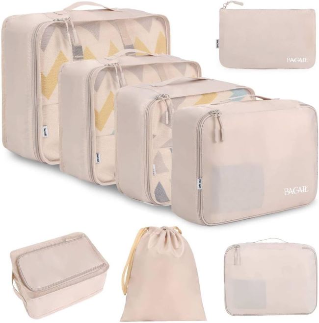 BAGAIL 8-piece packing cubes neatly organizing clothes inside a suitcase for travel from Wisconsin